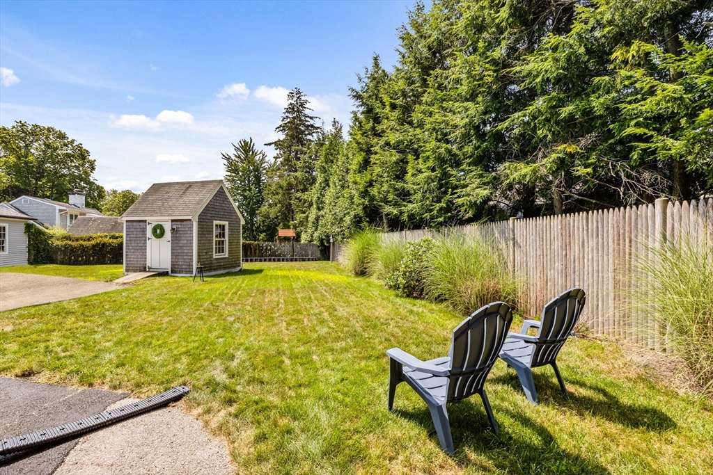 17 Pleasant Street Hingham, MA 02043 - Photo 38 of 41 a view of a house with backyard and sitting area