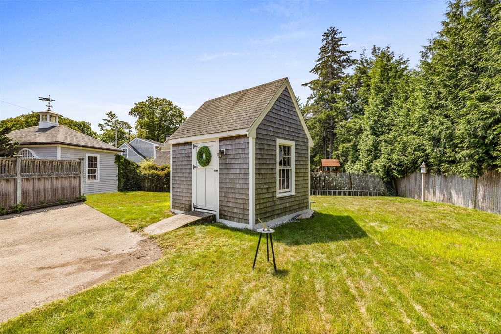 17 Pleasant Street Hingham, MA 02043 - Photo 40 of 41 a view of a house with backyard and tree s