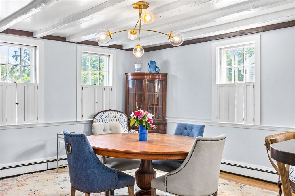 17 Pleasant Street Hingham, MA 02043 - Photo 4 of 41 a view of a dining room with furniture window and wooden floor