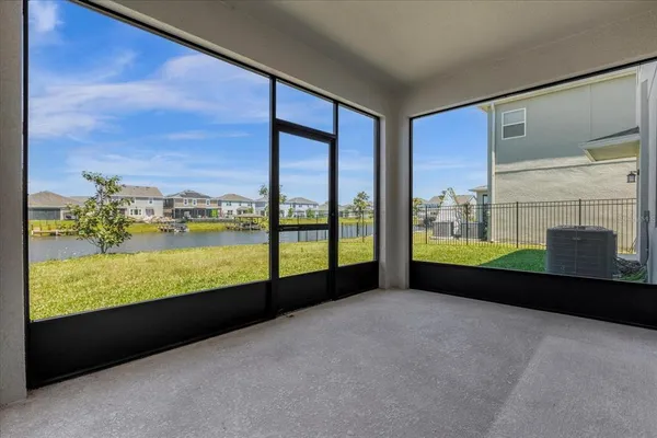 a view of balcony with furniture