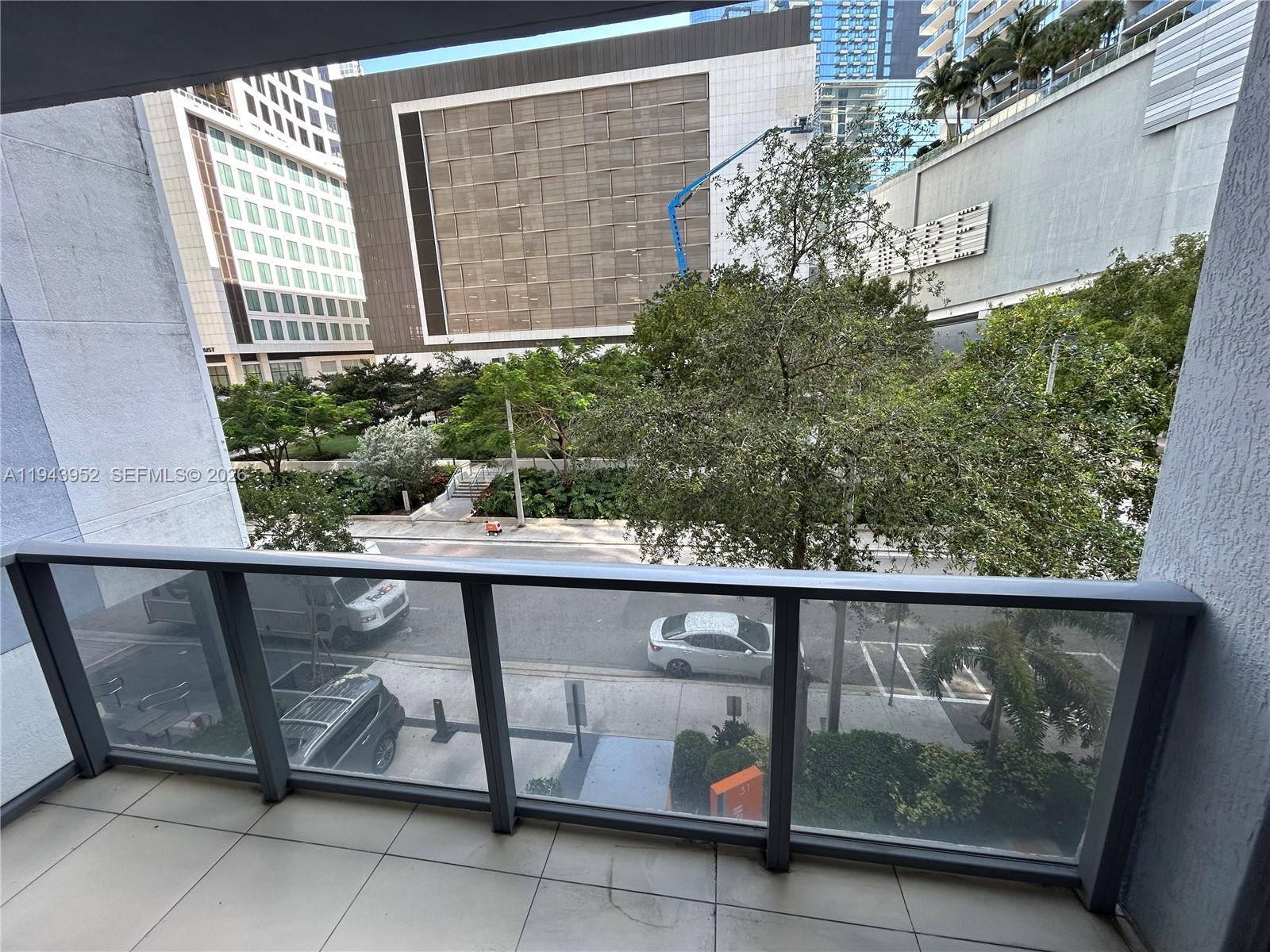 31 Southeast 6th Street, Unit 407 Miami, FL 33131 - Photo 22 of 22 a view of a outdoor space with swimming pool