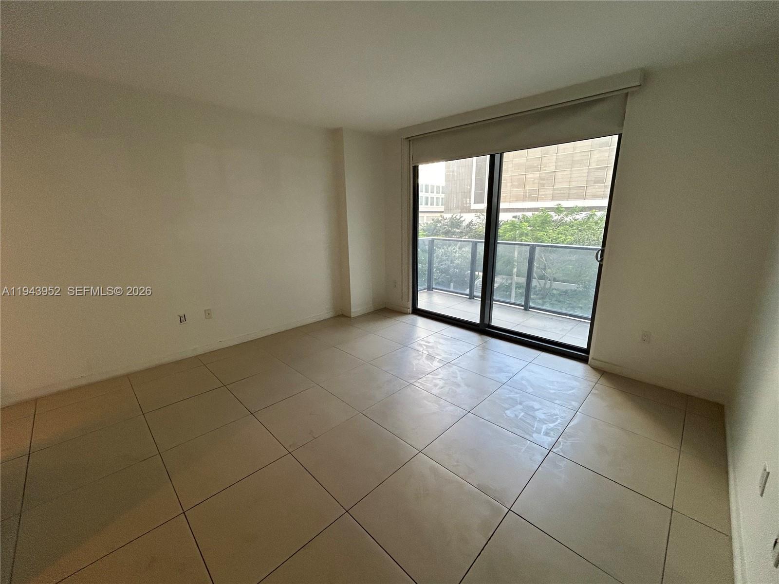 31 Southeast 6th Street, Unit 407 Miami, FL 33131 - Photo 7 of 22 a view of a room with a large window