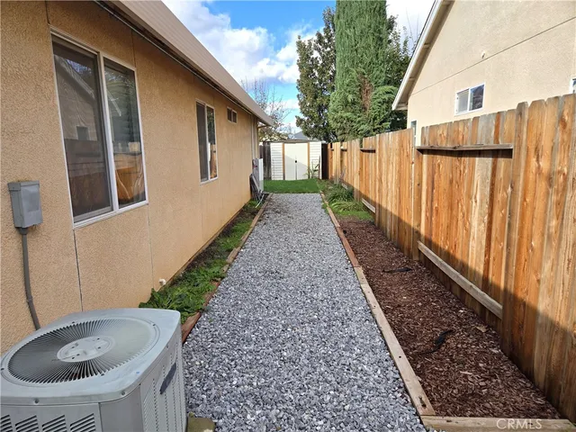 a view of a back yard of the house