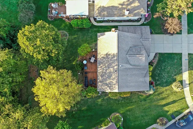 front view of a house with a garden