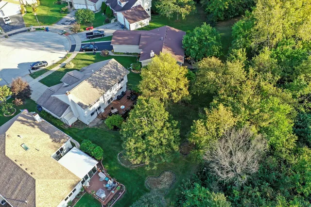 an aerial view of a house with a garden