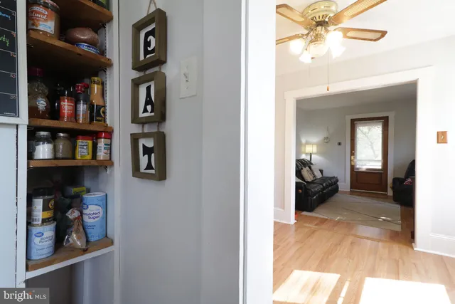 a room with furniture a window and gym equipment