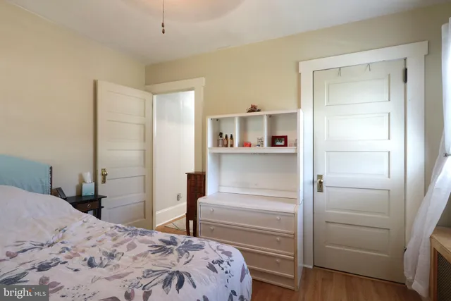 a room with furniture and wooden floor