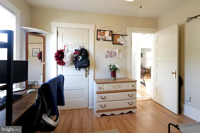 a room with furniture a flat screen tv and a fireplace