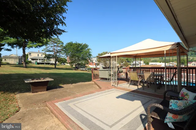 an aerial view of a house with a garden