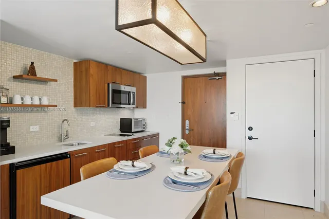 a view of a dining room with furniture