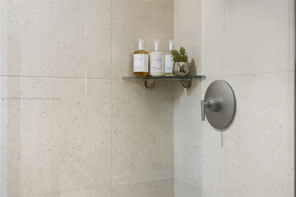 a bathroom with a sink and mirror