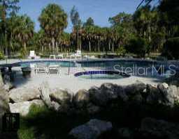 7627 Sailwinds Pass Port Richey, FL 34668 - Photo 1 of 1 Exterior Front - Pool Area