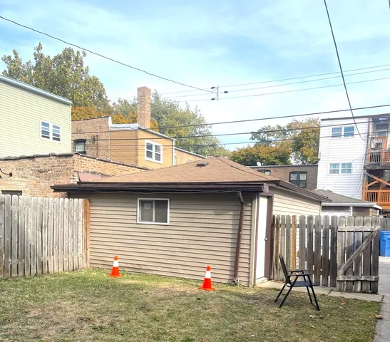 a view of a house with a garage