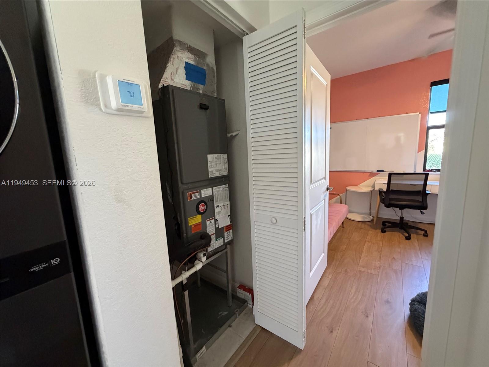 12990 Southwest 232nd Lane Homestead, FL 33032 - Photo 14 of 20 a view of kitchen and utility room