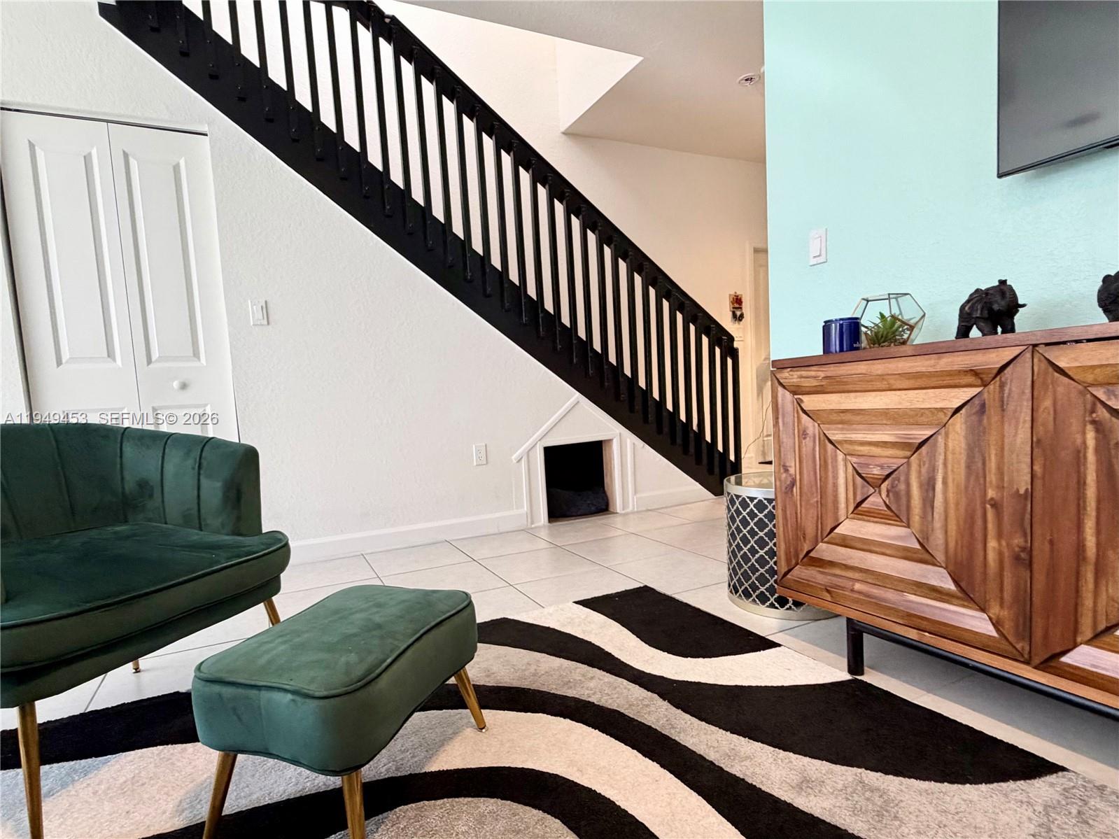 12990 Southwest 232nd Lane Homestead, FL 33032 - Photo 6 of 20 a view of entryway and hall with wooden floor