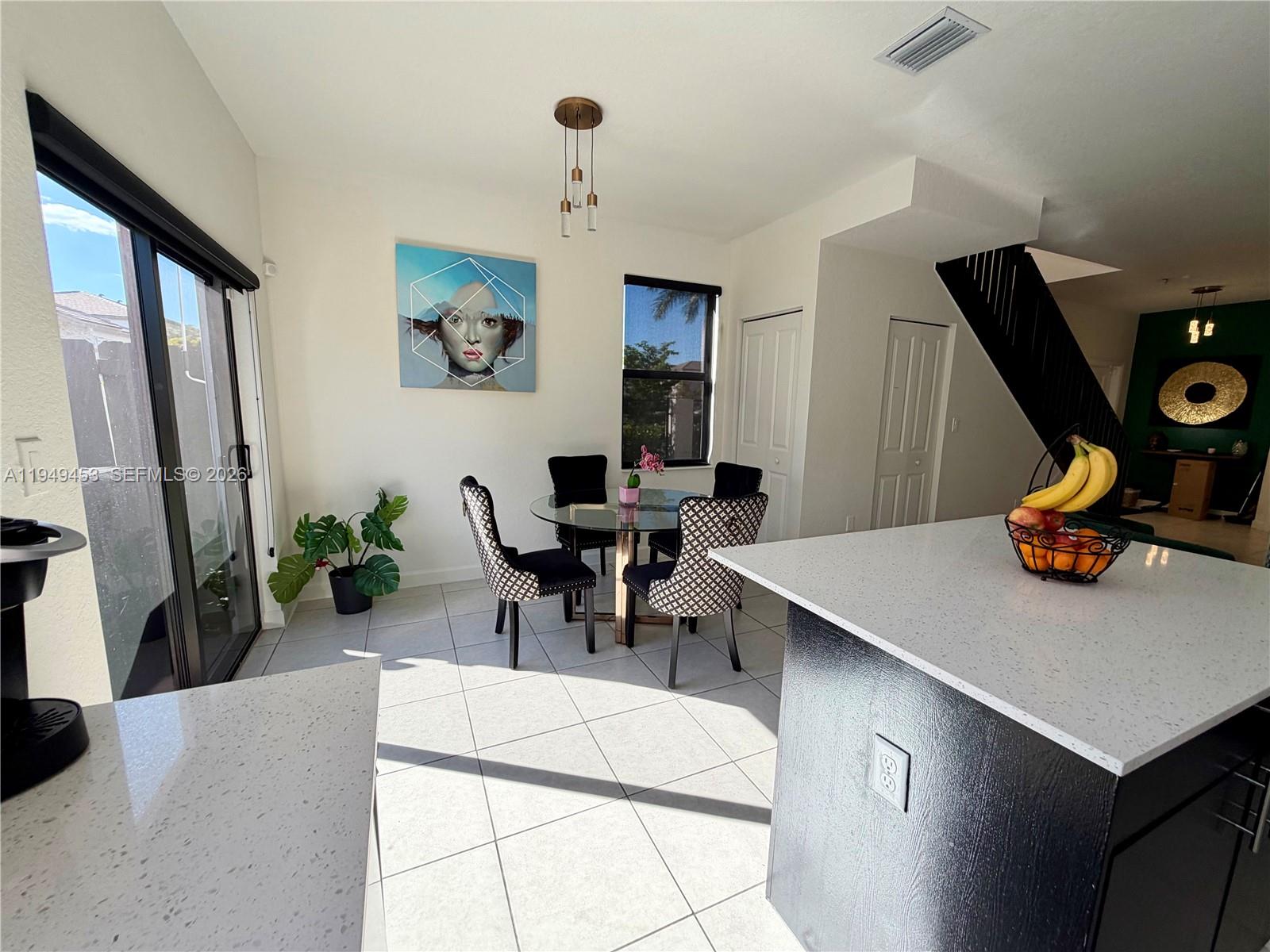 12990 Southwest 232nd Lane Homestead, FL 33032 - Photo 9 of 20 a workspace with furniture and window