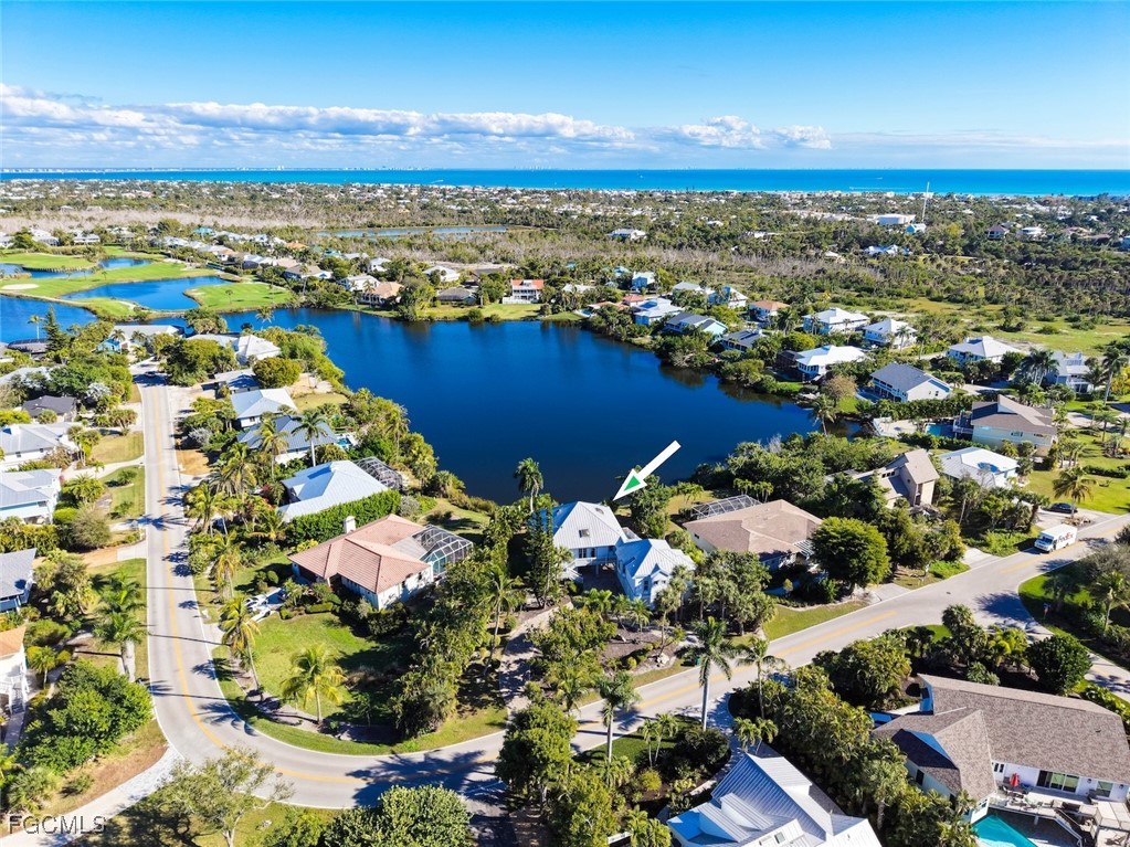 1401 Sand Castle Road Sanibel, FL 33957 - Photo 1 of 50 an aerial view of residential houses with outdoor space