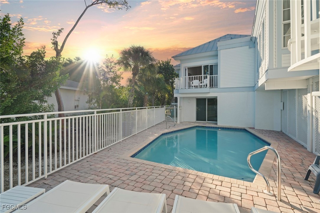1401 Sand Castle Road Sanibel, FL 33957 - Photo 21 of 50 a view of a house with swimming pool