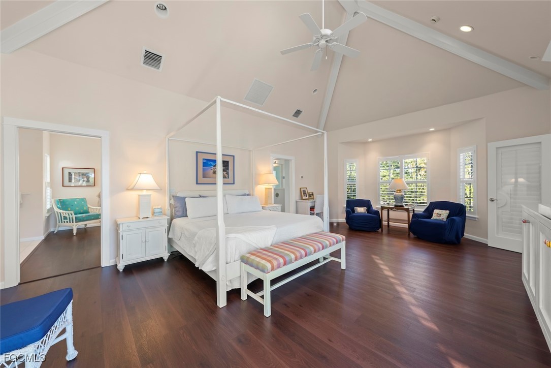 1401 Sand Castle Road Sanibel, FL 33957 - Photo 26 of 50 a spacious bedroom with a bed and furniture