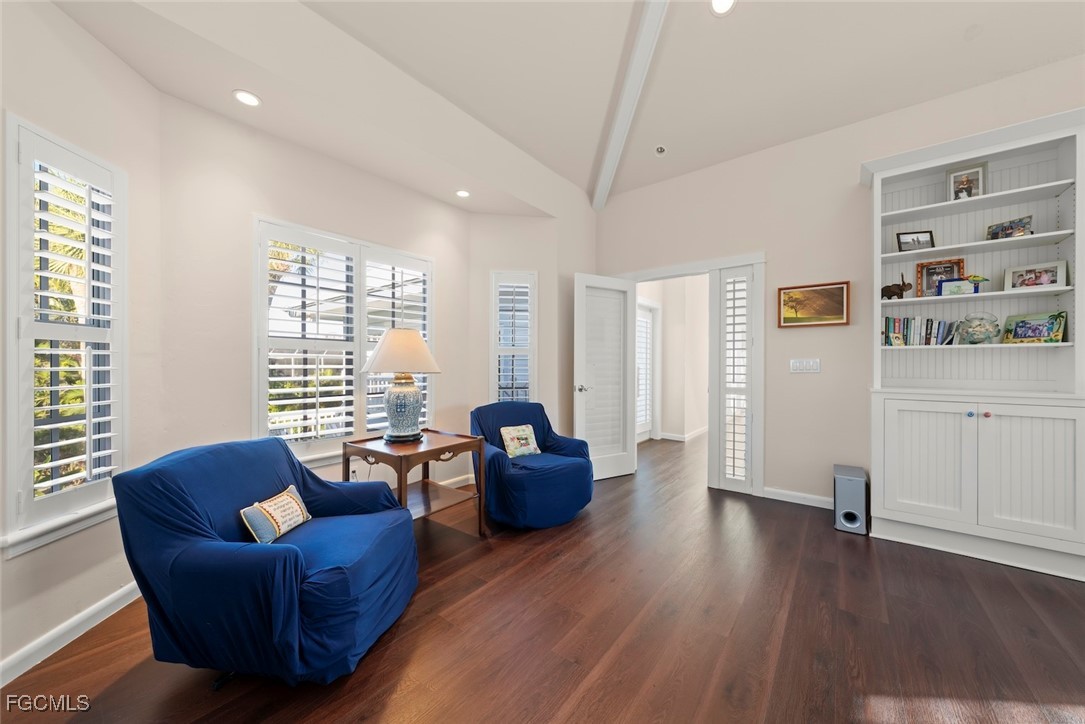 1401 Sand Castle Road Sanibel, FL 33957 - Photo 27 of 50 a living room with furniture and a large window