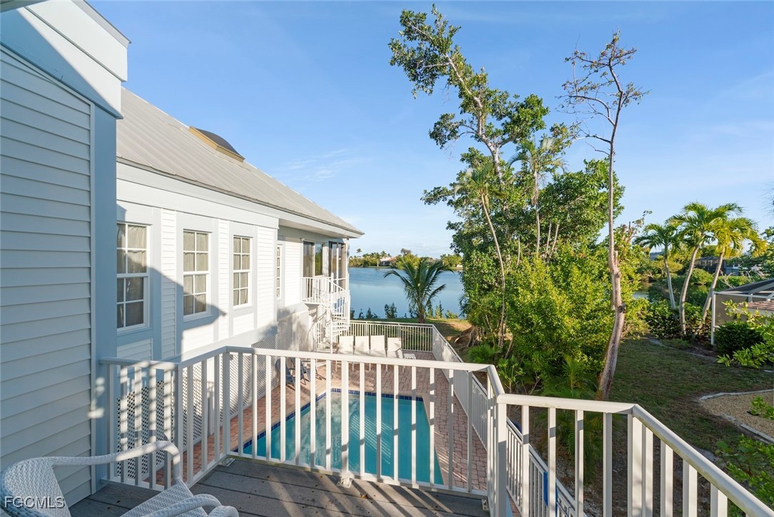 1401 Sand Castle Road Sanibel, FL 33957 - Photo 29 of 50 a view of a house with a flower garden