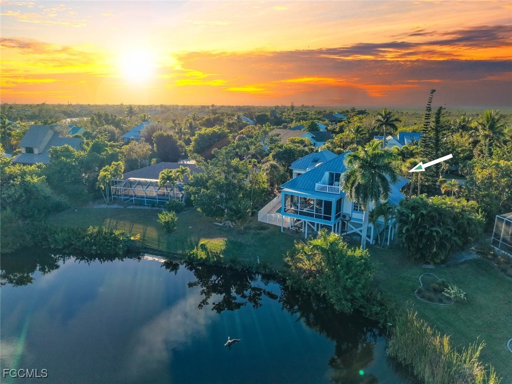 1401 Sand Castle Road Sanibel, FL 33957 - Photo 49 of 50 a view of a lake with a city