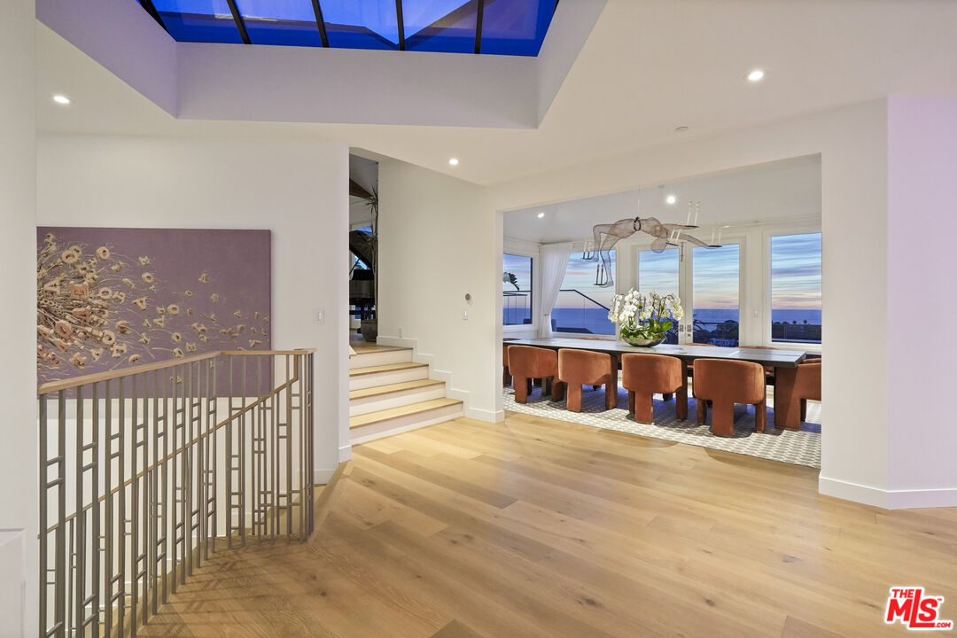 3140 Sweetwater Mesa Road Malibu, CA 90265 - Photo 66 of 71 a view of a living room and kitchen with furniture