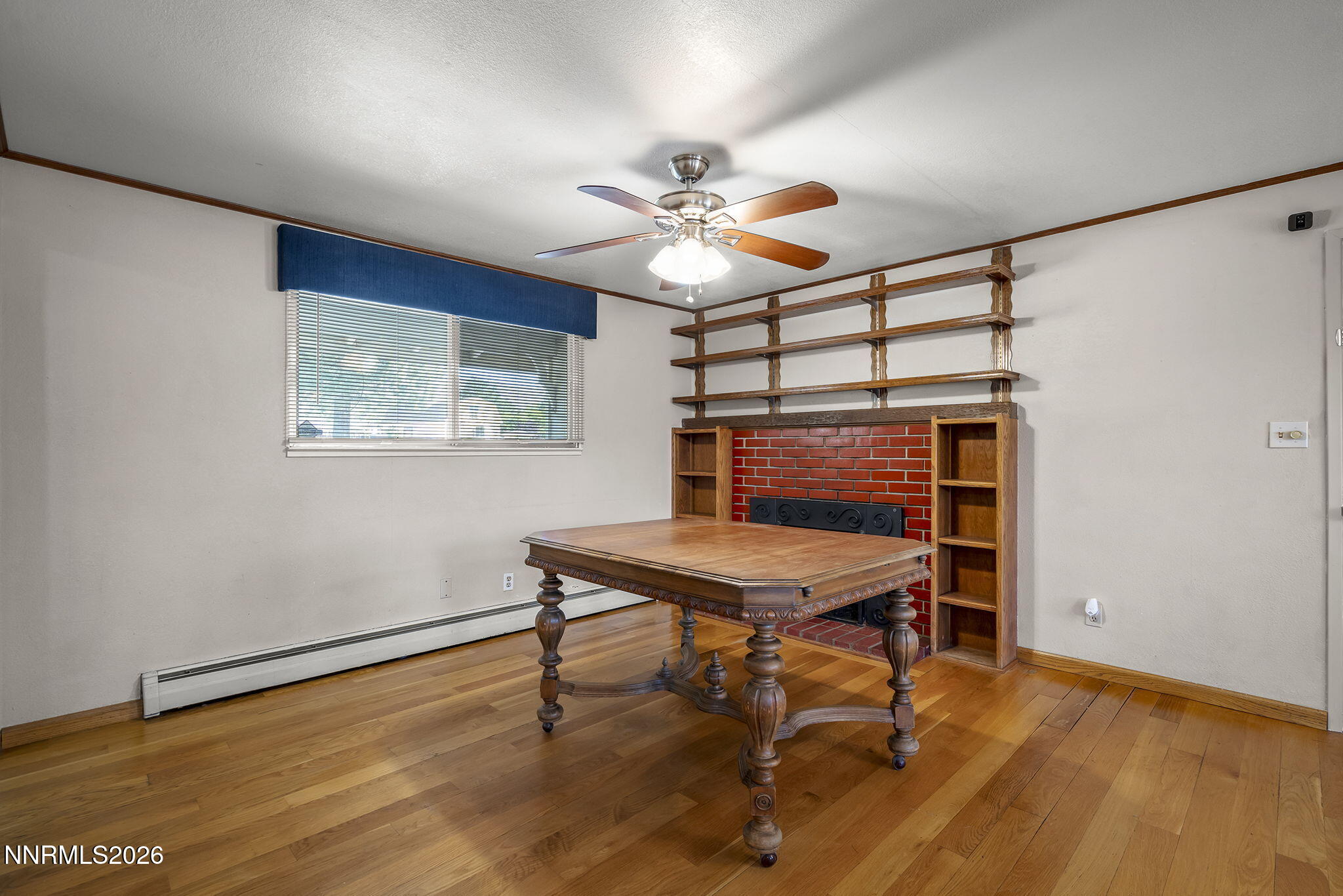 549 Ruby Lane Carson City, NV 89706 - Photo 9 of 37 a room with chandelier fan and wooden floor