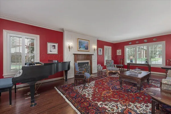 a large kitchen with stainless steel appliances granite countertop a large stove and a sink