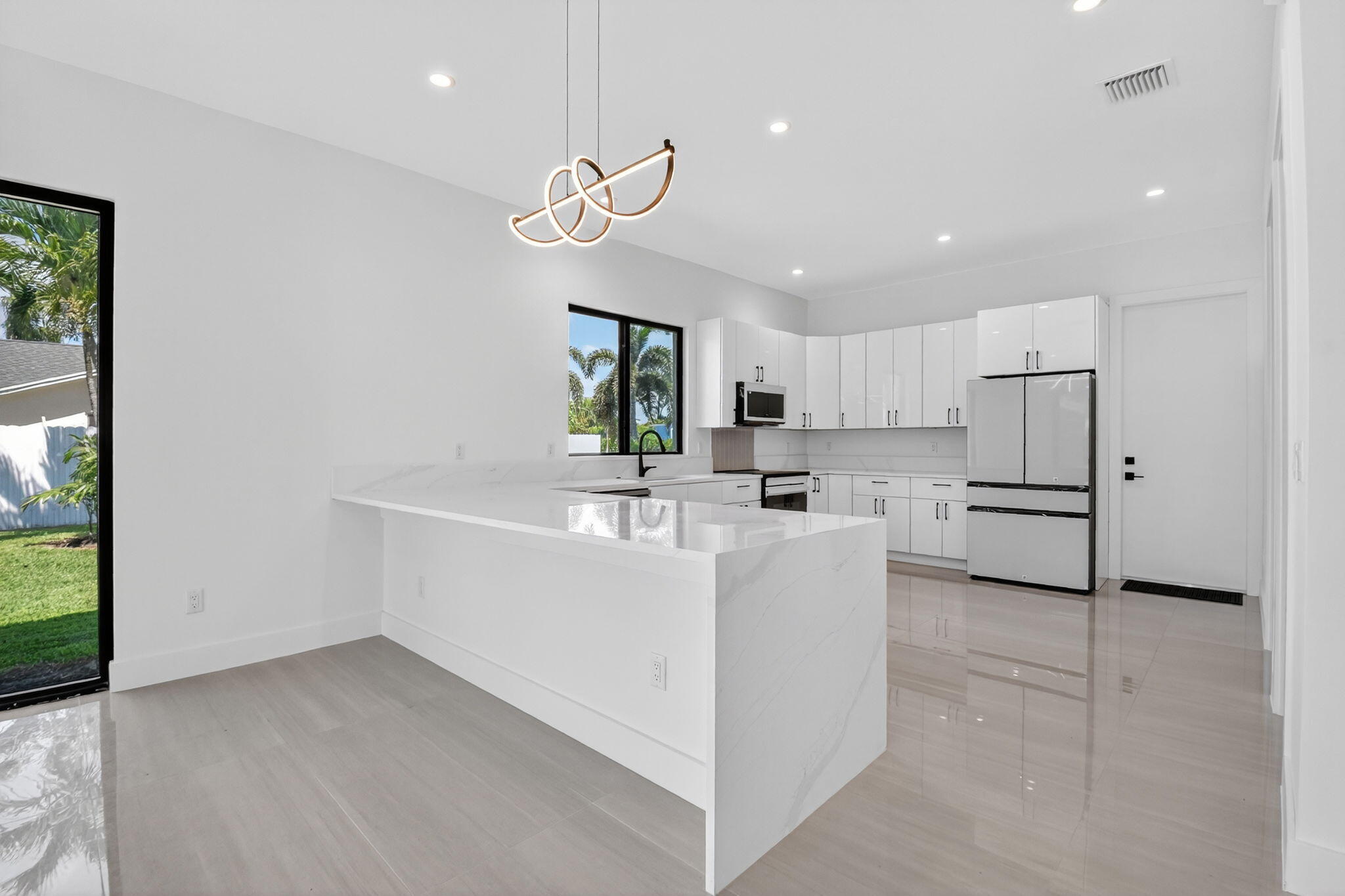 3920 Espan Court Palm Springs, FL 33461 - Photo 15 of 51 Kitchen