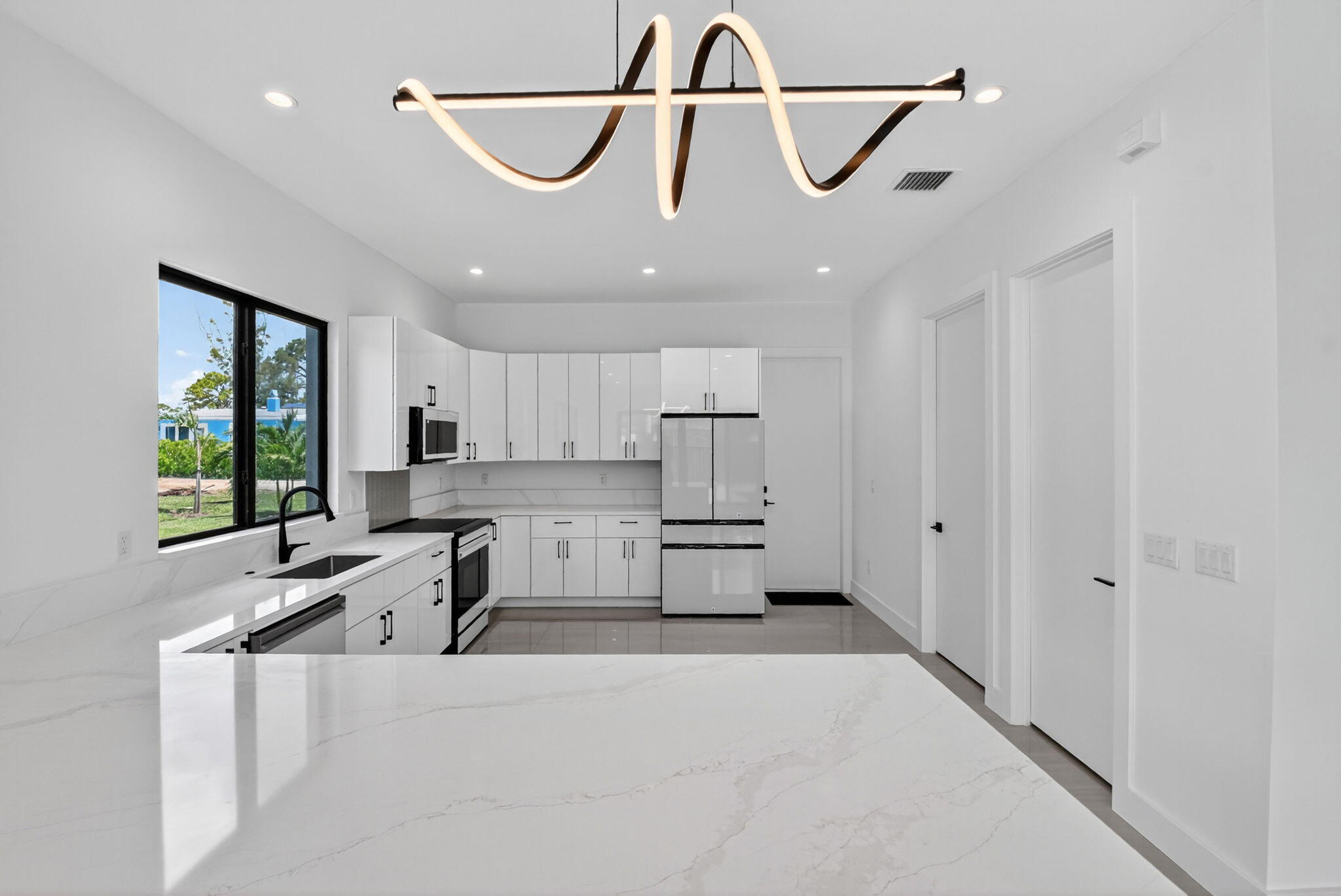 3920 Espan Court Palm Springs, FL 33461 - Photo 20 of 51 Kitchen