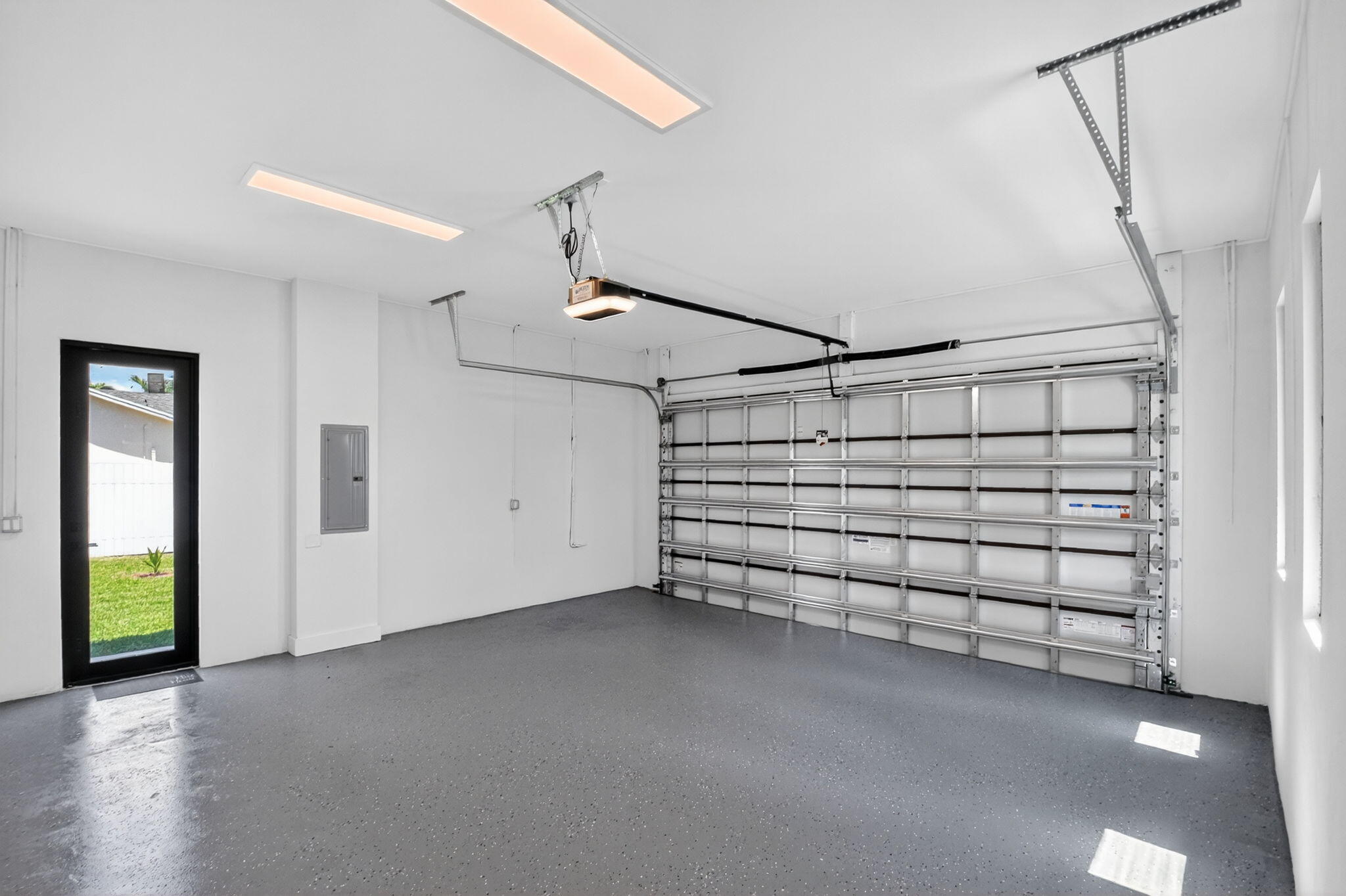 3920 Espan Court Palm Springs, FL 33461 - Photo 46 of 51 Garage