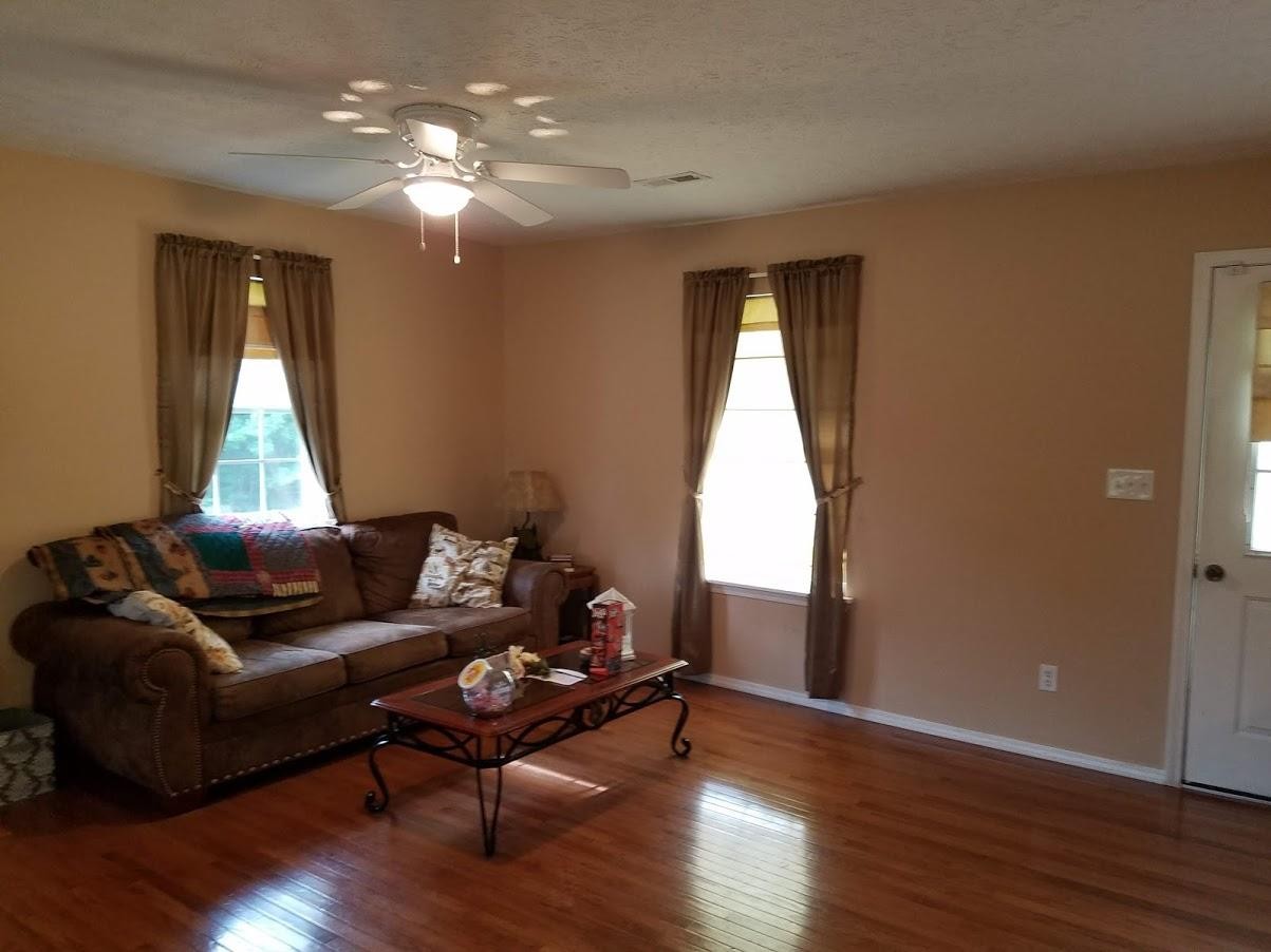 467 Ridge Road Lancing, TN 37770 - Photo 11 of 40 a living room with furniture and wooden floor