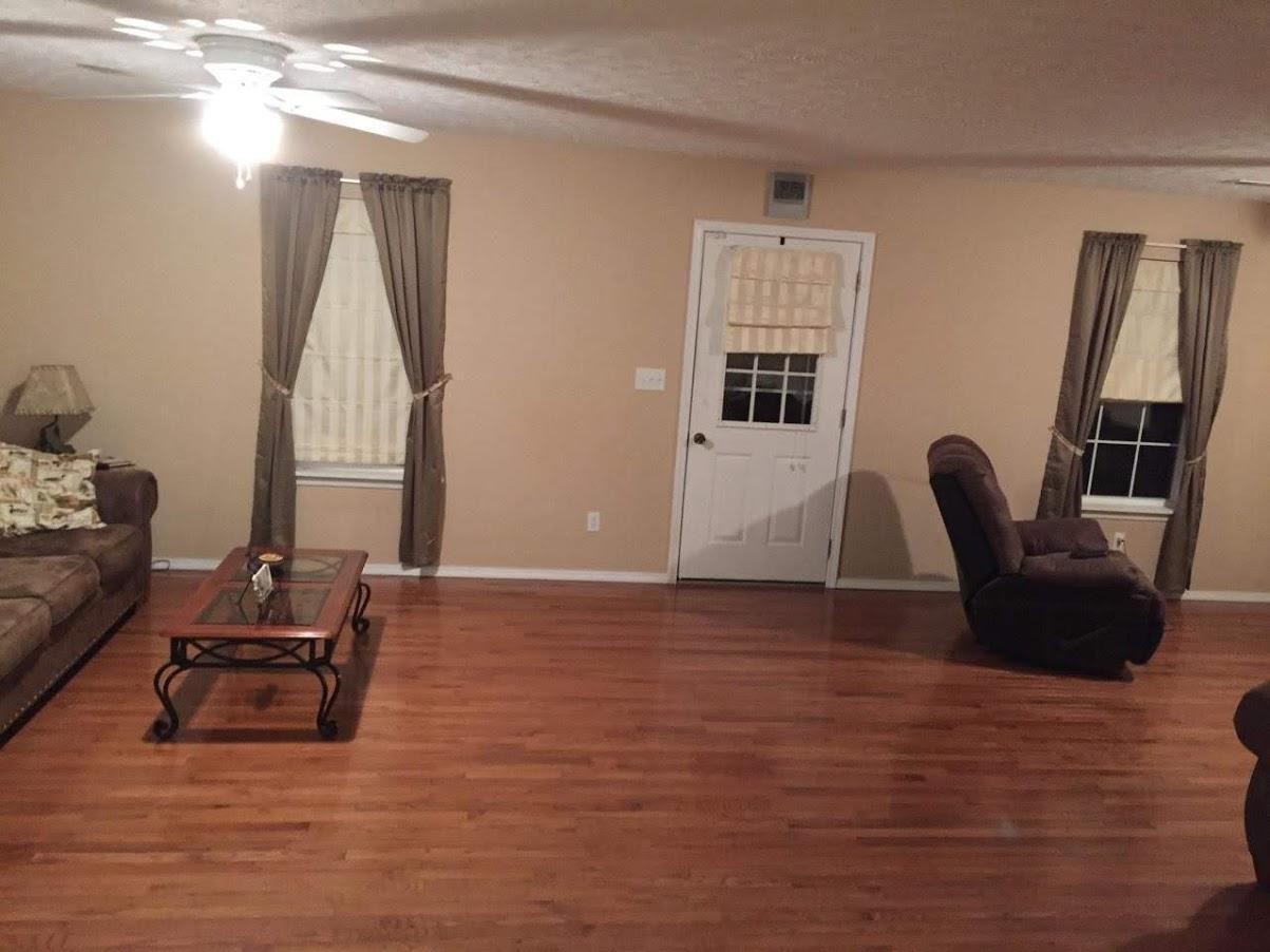 467 Ridge Road Lancing, TN 37770 - Photo 15 of 40 a living room with furniture and a large window