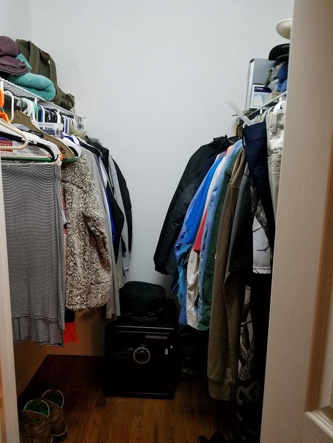 467 Ridge Road Lancing, TN 37770 - Photo 23 of 40 a view of walk in closet with clothes and shoes
