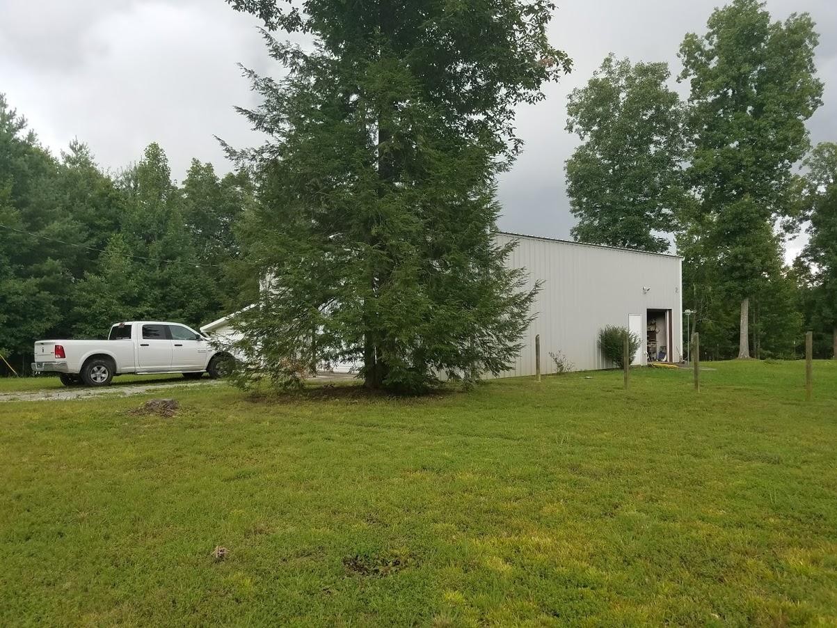 467 Ridge Road Lancing, TN 37770 - Photo 28 of 40 a view of a car parked in the yard