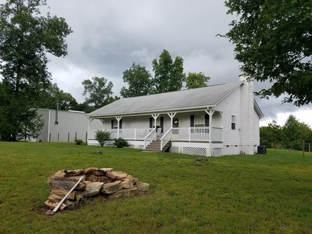 467 Ridge Road Lancing, TN 37770 - Photo 3 of 40 a front view of a house with garden