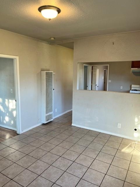 325 North 7th Street Fowler, CA 93625 - Photo 3 of 10 an empty room with windows