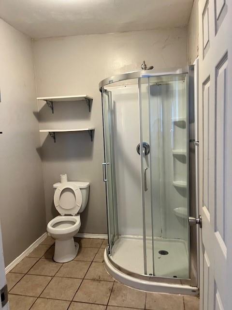 325 North 7th Street Fowler, CA 93625 - Photo 6 of 10 a bathroom with a toilet and a shower