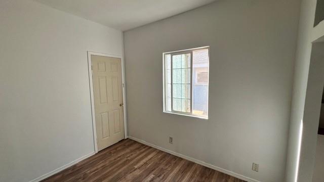 325 North 7th Street Fowler, CA 93625 - Photo 7 of 10 an empty room with windows
