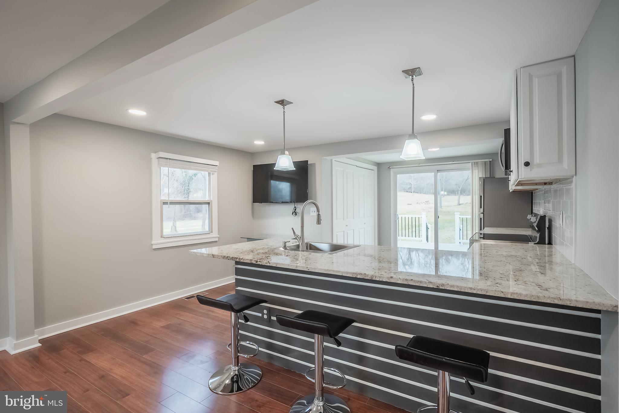 6946 Blantyre Road Warrenton, VA 20187 - Photo 5 of 24 a kitchen with sink and window
