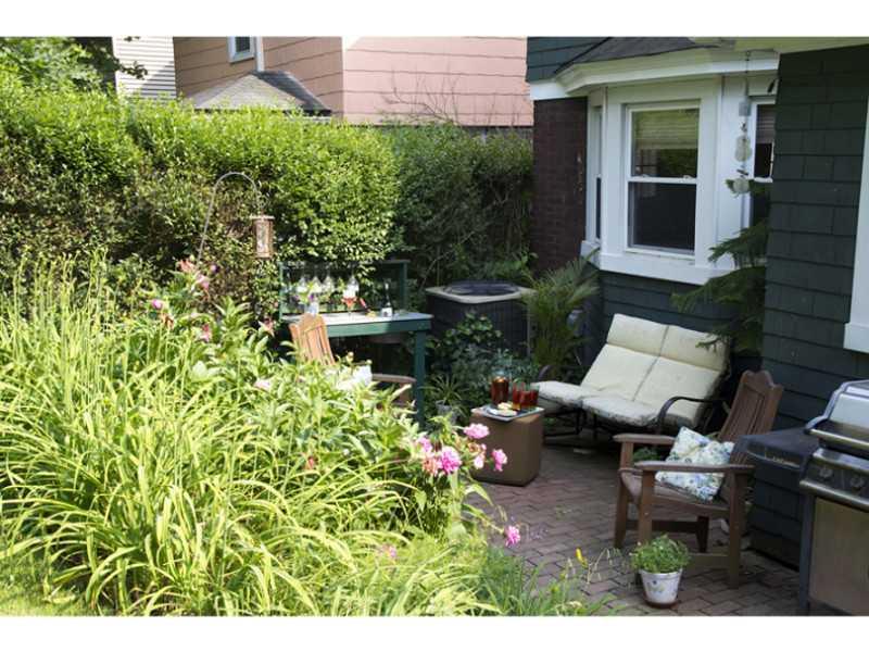 205 Elm Street Edgewood, PA 15218 - Photo 16 of 19 Patio/Deck. Charming Brick Patio in Private Rear Yard. Perfect for Summer Relaxation