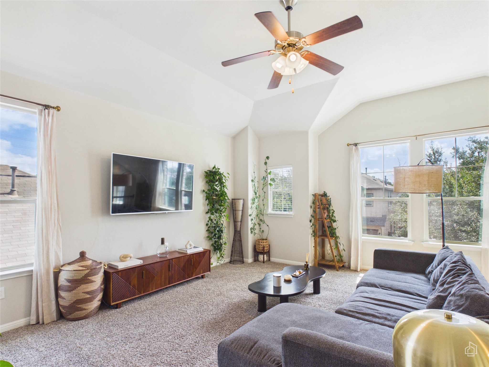9310 Tanager Way Austin, TX 78748 - Photo 16 of 32 Tall ceilings and abundant natural light enhance this inviting living space.