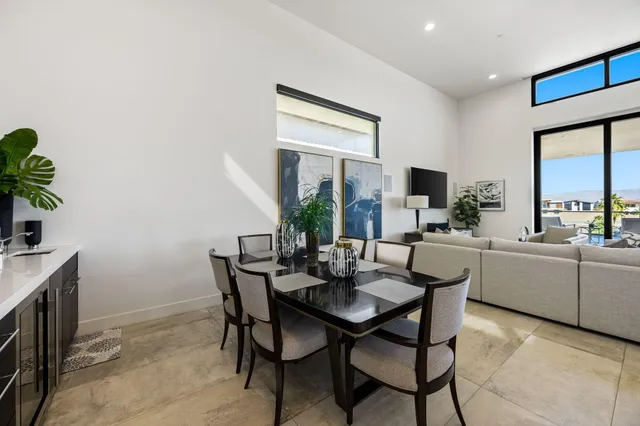 a bathroom with a double vanity sink and mirror