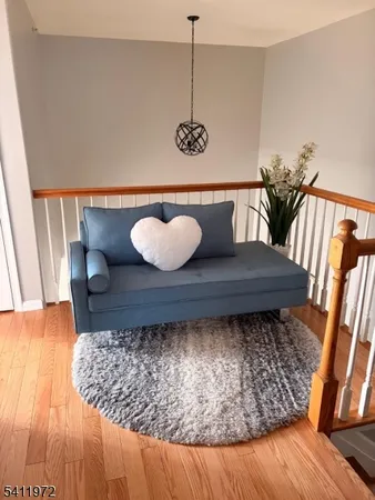 a bathroom with a toilet and a shower curtain