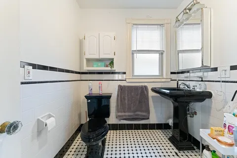 a kitchen with a sink and a stove