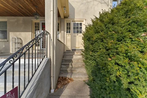 a view of a house with stairs