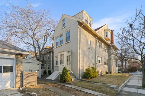 a view of a building with a street