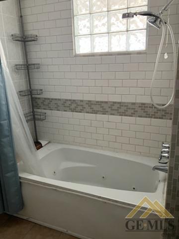 Undisclosed Address Ridgecrest, CA 93555 - Photo 14 of 30 a bathroom with a bathtub