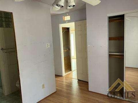 Undisclosed Address Ridgecrest, CA 93555 - Photo 17 of 30 a view of a livingroom with a hardwood and a refrigerator